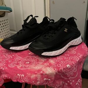 Women’s Chanel Black and white sneakers